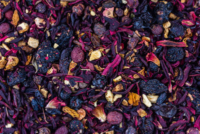 Texture of dry berry tea top view close up