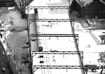 Low angle view of snow covered buildings in city