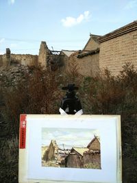 Man standing in front of building