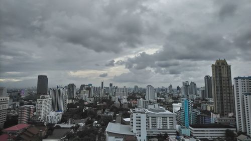 High angle view of modern buildings in city against sky