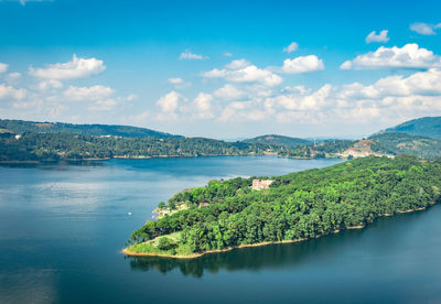 Serene lake with mountain background at day from top angle