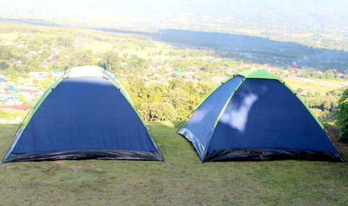 Tilt image of tent on field against sky