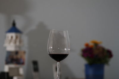Close-up of wineglass on glass