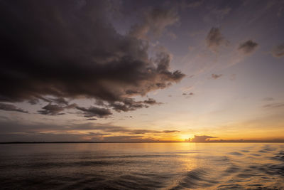 Beautiful colorful amazon sunset over the waters of negro river