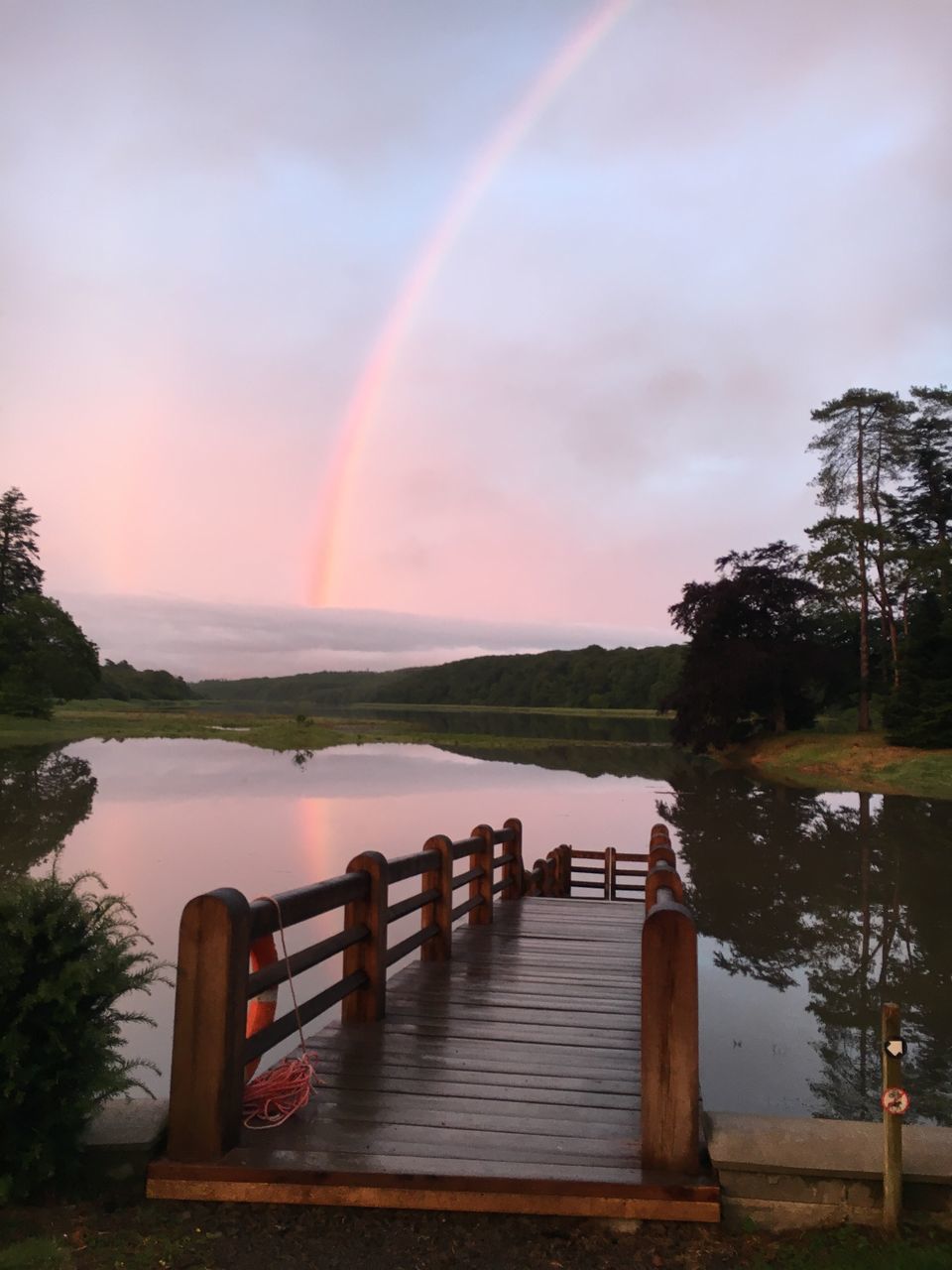 water, scenics, rainbow, beauty in nature, nature, tranquility, tranquil scene, tree, jetty, no people, sky, wood - material, lake, outdoors, day