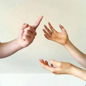 Close-up of hands indicating argument