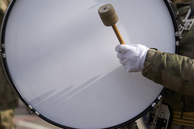 Close-up of hand holding umbrella