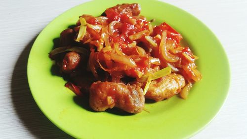 Close-up of served food in plate