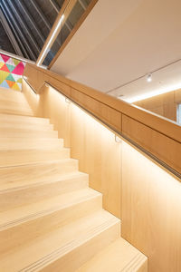 Low angle view of illuminated staircase in building