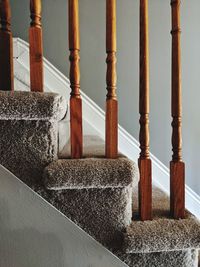 Close-up of staircase against wall