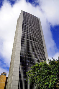 Low angle view of modern building against sky