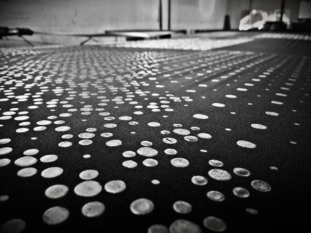 transportation, pattern, surface level, indoors, empty, close-up, street, textured, metal, road, the way forward, diminishing perspective, focus on foreground, road marking, no people, selective focus, full frame, backgrounds, absence, in a row