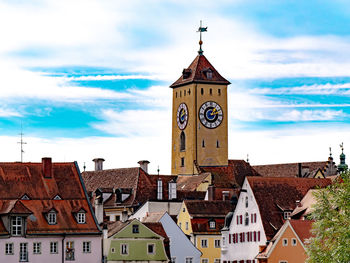 Low angle view of clock tower against sky