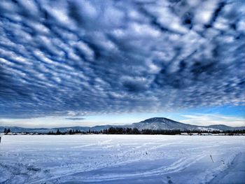 Scenic view of snow covered landscape