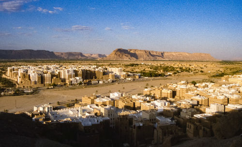 Buildings in city against sky