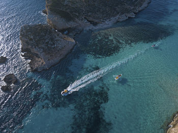 Aerial view of boats sailing in sea