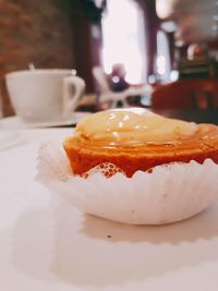 Close-up of cake served on table