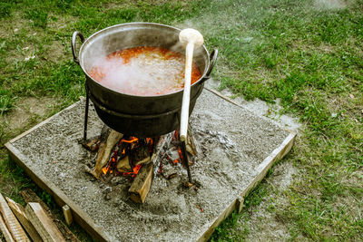 Romanian traditional food prepared at the cauldron on the open fire