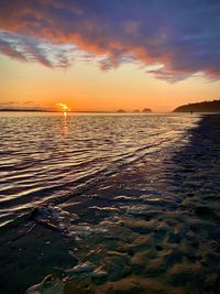 Scenic view of sea against sky during sunset