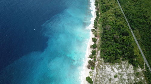 Scenic view of sea against blue sky