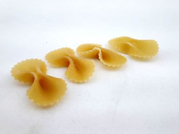 Close-up of cake against white background