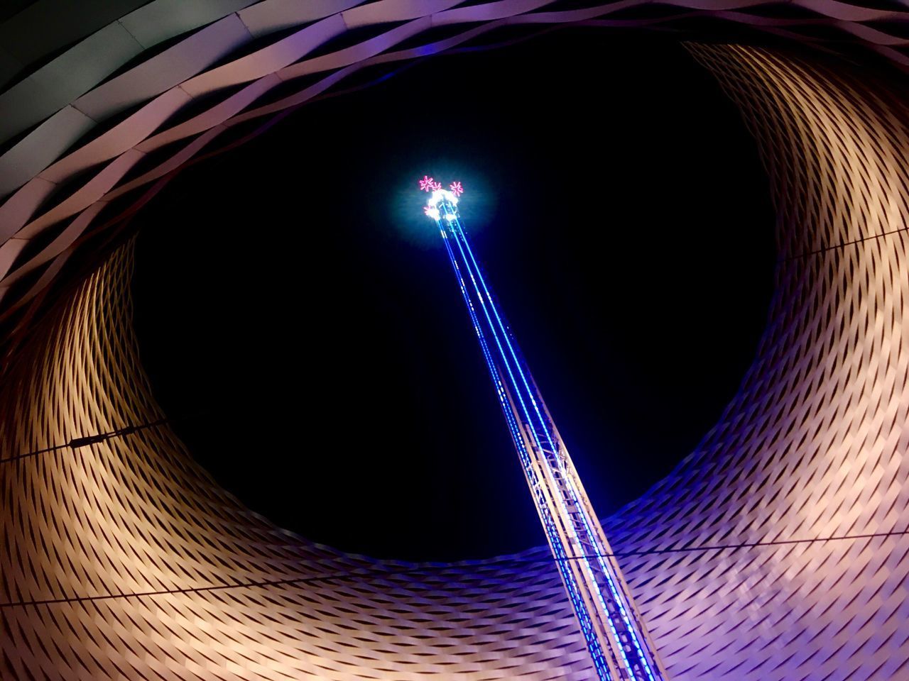 LOW ANGLE VIEW OF ILLUMINATED LIGHTING EQUIPMENT AGAINST BLUE SKY