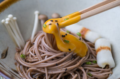 Close-up of noodles in bowl on table