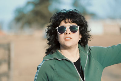 Young beautiful woman wearing sunglasses