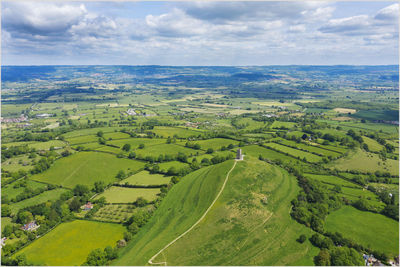 Aerial view of agricultural landscape against sky