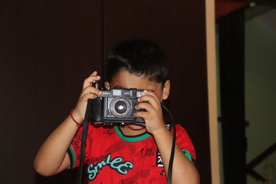 Portrait of man photographing
