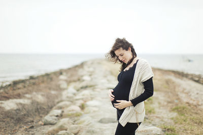 Pregnant woman at sea