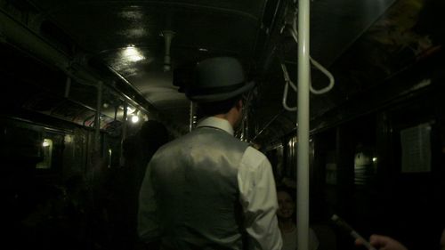 Woman standing at night