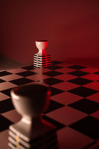 Close-up of chess pieces on table