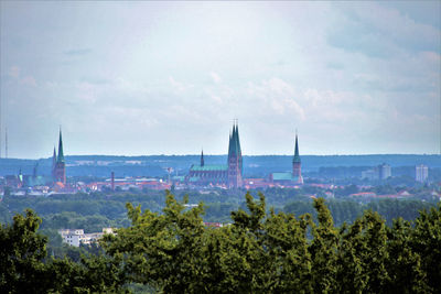 Panoramic view of cityscape against sky