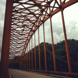 Suspension bridge against sky