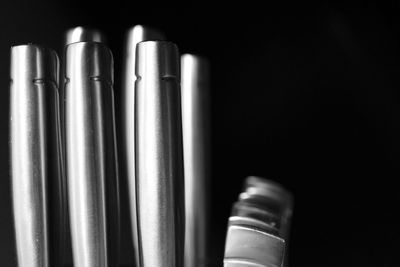 Close-up of electric lamp against black background