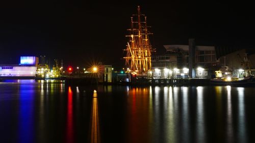 Illuminated harbor at night