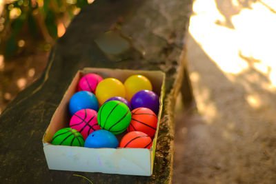 Close-up of multi colored balloons on tree