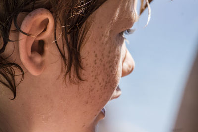 Close-up of freckles boy face