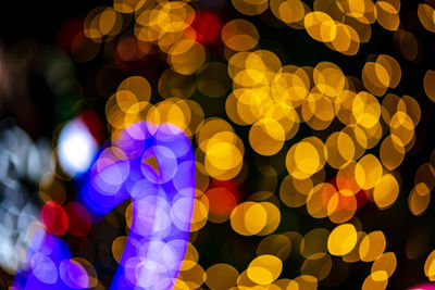 Gold yellow abstract bokeh multi color, defocus bokeh on isolated black background.