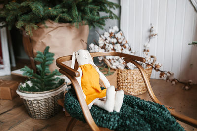 Close-up of stuffed toy on chair