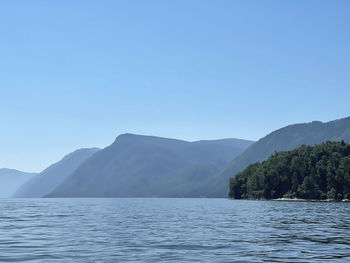 Lake teletskoye in sunny day. altai, russia.