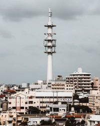 Buildings in city against sky