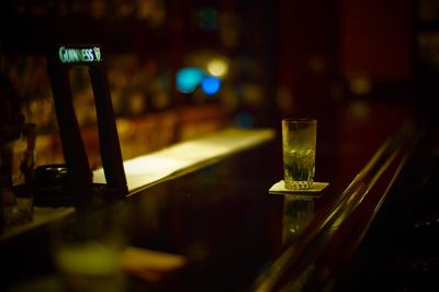 Illuminated information sign at night