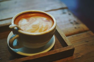 Close-up of cappuccino on table