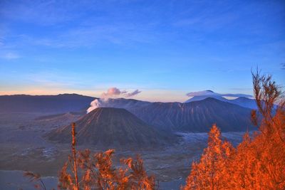 View of volcanic landscape against sky