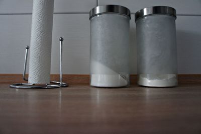 Close-up of ingredient in jars on table