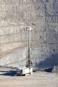 Blasthole drill in an open pit copper mine operation in chile