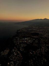 High angle view of townscape against sky during sunset