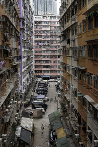 High angle view of street amidst buildings in city